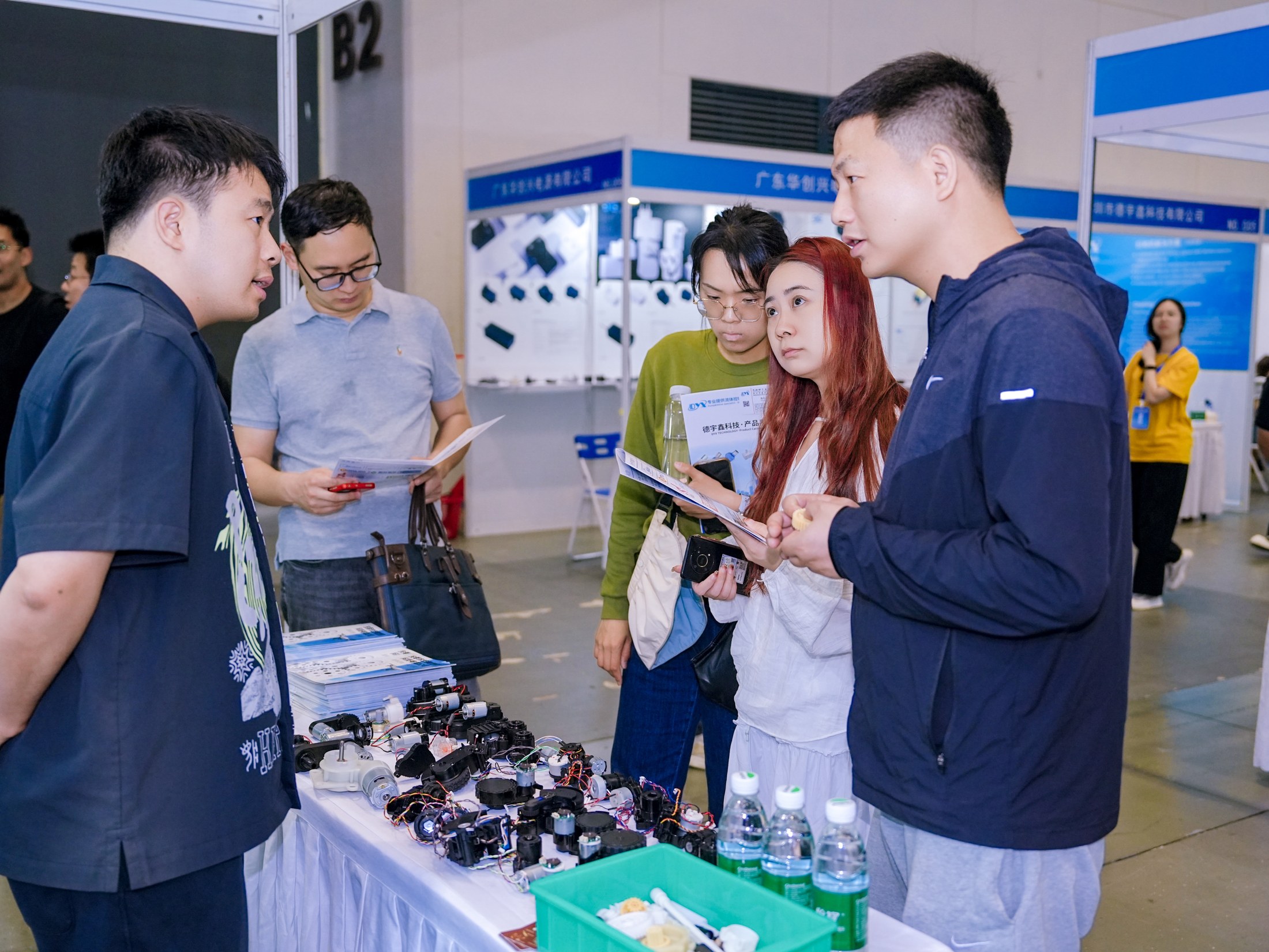 Supplier meeting at a cleaning industry exhibition